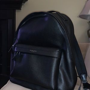 Michael Kors book bag.  Unisex